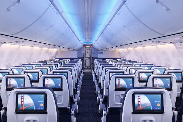 நடுவானில் விமானத்தின் கதவை திறக்க முயன்ற நபர்!