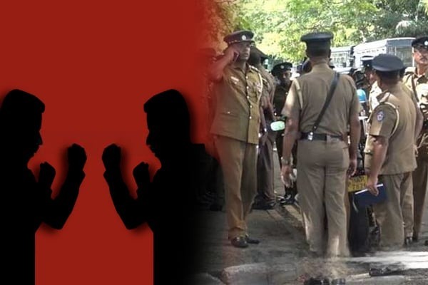 தமிழர் பகுதிகளில் பொலிஸ் அதிகாரிகள் இருவருக்கு கடையில் கடும் மோதல்